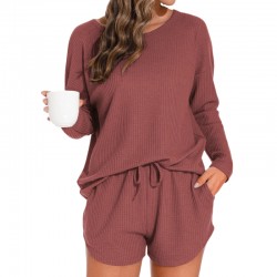 Waffle knit women's pajama set with long-sleeved top and short pants for a casual outfit that can be worn outside